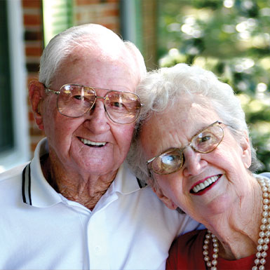 Photo of an older couple smiling. Link to Life Stage Gift Planner Over Age 70 Situations.