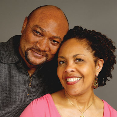 Photo of a couple smiling. Link to Life Stage Gift Planner Under Age 60 Situations.